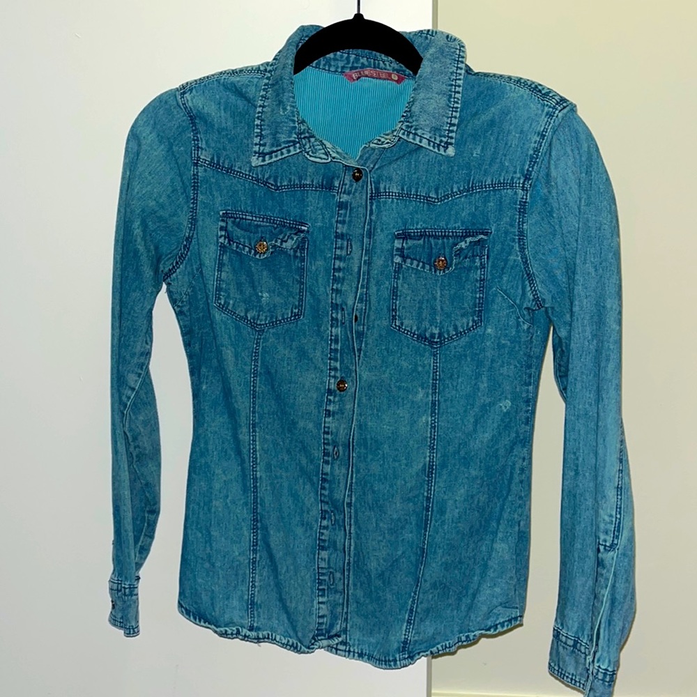 XS greenish jean shirt, might look too short if you’re tall - I’m a 5’3”